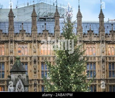 London, UK. 26th Nov, 2019. The festively lit Christmas tree at the Houses of Parliament is up. Although it is still November, nearly all shopping streets and London landmarks have now got their Christmas decorations and illuminations iup. Credit: Imageplotter/Alamy Live News Stock Photo