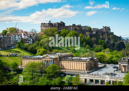 Skyline of Princes Street Gardens, Edinburgh Castle, and the Scottish National Gallery  in Edinburgh, Scotland, UK Stock Photo
