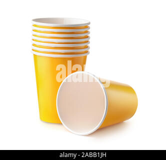 Group of yellow disposable paper cups isolated on white Stock Photo