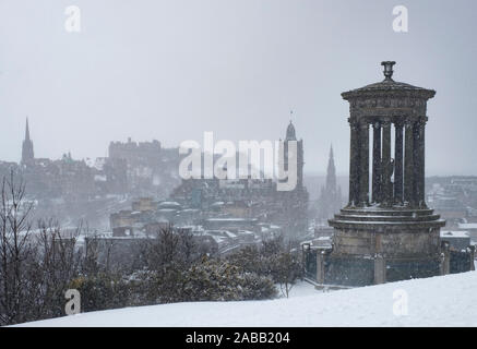 View from Calton Hill over city of Edinburgh during heavy snow falls , Scotland, United Kingdom Stock Photo