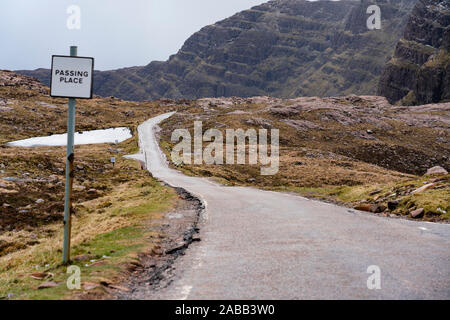 View of single track road and passing place on Bealach na Ba pass on Applecross Peninsula  the North Coast 500 driving route in northern Scotland, UK Stock Photo