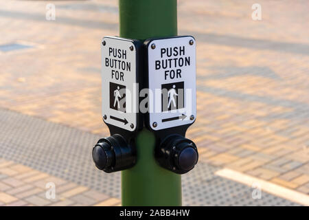 Push Button for Walking - sign on street pole Stock Photo