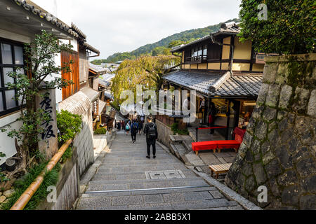 Kyoto, Japan - 10/30/19 - People in the old streets around the Kiyomizu-dera temple complex.