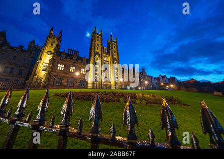 Night view of Edinburgh University New College building on The Mound in Edinburgh Old Town, Scotland, UK Stock Photo