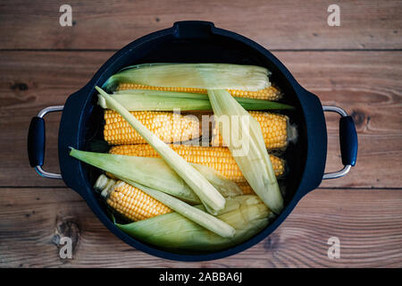 Cooked corn on the Cob. Golden colored boiled corn on the cob Stock Photo