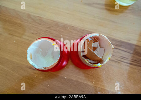 Empty egg shell in egg cup red Stock Photo