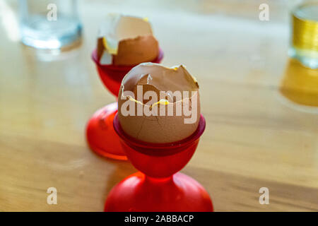 Empty egg shell in egg cup red Stock Photo
