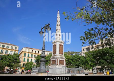 General Torrijos Monument which is obelisk shaped & situated in the downtown city centre public square; Plaza de la Merced, Malaga, Andalusia, Spain Stock Photo