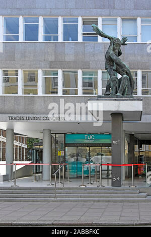 TUC Congress House entrance to headquarters office building of Trades Union Congress dominated by bronze statue by Bernard Meadows London England UK Stock Photo