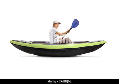 Elderly man kayaking isolated on white background Stock Photo