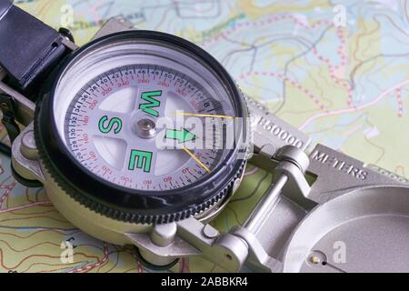Close-up of military compass on map Stock Photo