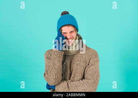 Stay warm. Frown man in casual fashion wear. Handsome guy with winter look. Young male style and fashion. Fashion trends for cold weather. Warm and cozy fashion accessories. Stock Photo