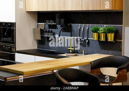 Modern stylish kitchen with breakfast bar. Selective focus. Stock Photo