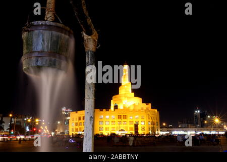 water overflow from bucket souq waqif Stock Photo