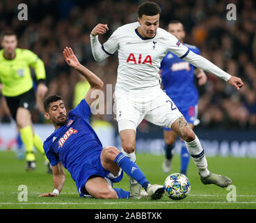 London, UK. 26th Nov, 2019. Tottenham Hotspur's Dele Alli (R) vies with Olympiakos' Yassine Meriah during the UEFA Champions League Group B match at the Tottenham Hotspur Stadium in London, Britain on Nov. 26, 2019.FOR EDITORIAL USE ONLY. NOT FOR SALE FOR MARKETING OR ADVERTISING CAMPAIGNS. NO USE WITH UNAUTHORIZED AUDIO, VIDEO, DATA, FIXTURE LISTS, CLUB/LEAGUE LOGOS OR 'LIVE' SERVICES. ONLINE IN-MATCH USE LIMITED TO 45 IMAGES, NO VIDEO EMULATION. NO USE IN BETTING, GAMES OR SINGLE CLUB/LEAGUE/PLAYER PUBLICATIONS. Credit: Xinhua/Alamy Live News Stock Photo