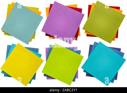 sticky reminder notes isolated on white - a set of notepad stacks with different color variations, office communication concept Stock Photo