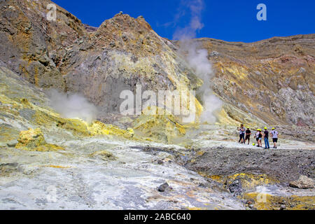 Tourist group on Whakaari (White Island), New Zealand's most active volcano Stock Photo