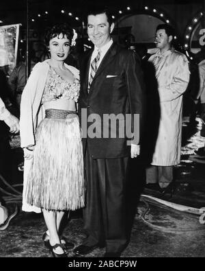 Ann Blyth with husband Dr. James McNulty who is holding their newborn ...