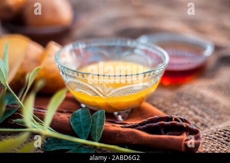 Potato juice s face pack or face mask in a glass bowl on jute