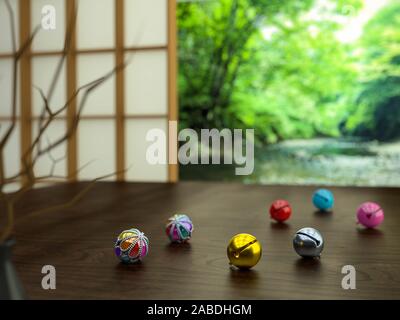 Japanese bells on the table. suzu on the table.Japanese style room. 3d illustration Stock Photo