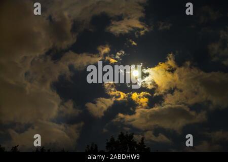 Super moon illuminating the night sky Stock Photo