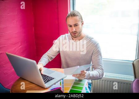 Interior designer choosing colors for his new project Stock Photo