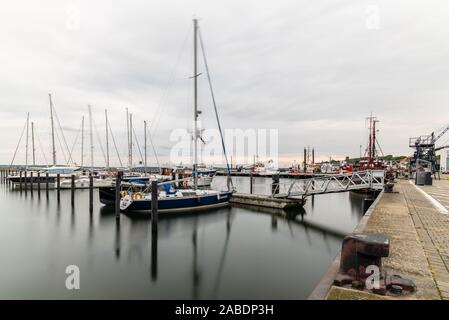 Sassnitz, Germany - August 1, 2019: Scenic view of sailing boats moored in the harbour. Sassnitz is a small town located in Rugen Island Stock Photo