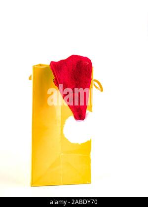Santa Claus Christmas gift under the Christmas tree on a white background with place for text. New Year's holidays. Background image. Free space for t Stock Photo