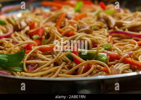 Indian stir fried chow mein Hakka noodles with chicken Stock Photo