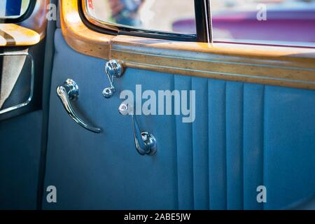 During a custom hot rod & antique car show this vehicle was one of the many on display that the people were able to see and ask owners' any questions. Stock Photo