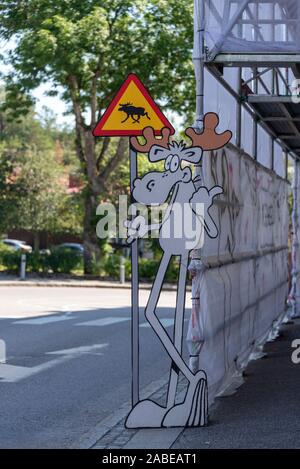 11 July 2019, Sweden, Strömstad: On a street in Strömstad there is a warning sign 'Beware of moose'. Photo: Stephan Schulz/dpa-Zentralbild/ZB Stock Photo