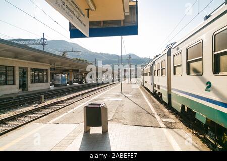 Perspective view on train station in Sarzana Stock Photo
