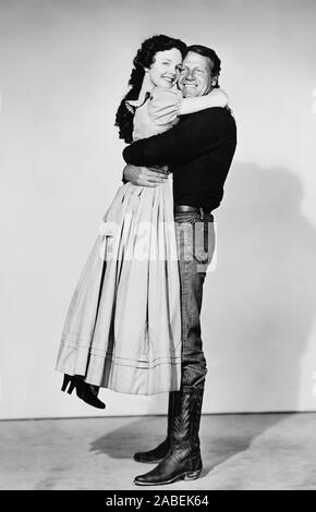 SADDLE TRAMP, from left: Wanda Hendrix, Joel McCrea, 1950 Stock Photo