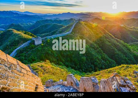 Picture of the sunset at the Jingshanling Great Wall in Chengde city, north China's Hebei province, 6 October 2019. Stock Photo