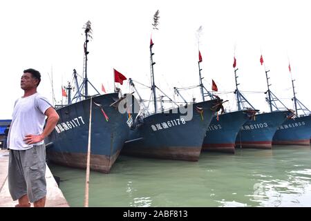 Fishing boats stop at Lanshan fishing port after catching enough ...