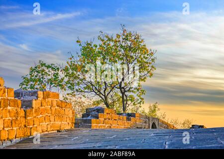 Picture of the sunset at the Jingshanling Great Wall in Chengde city, north China's Hebei province, 6 October 2019. Stock Photo