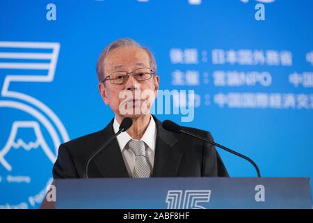 Japanese politician Yasuo Fukuda, who served as Prime Minister of Japan from 2007 to 2008, delivers a speech during the 15th Beijing-Tokyo Forum in Be Stock Photo