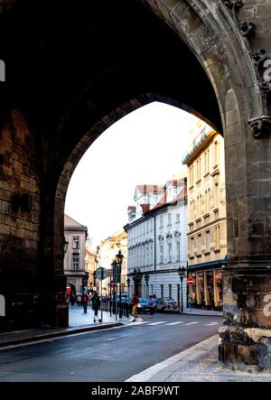 Architectural buildings in Prague town center seen through an archway in Prague, Czech Republic Stock Photo