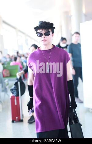 Chinese ballerina, modern dancer, choreographer, actress and transsexual celebrity arrives at Shanghai Hongqiao Airport before departure in Shanghai, Stock Photo