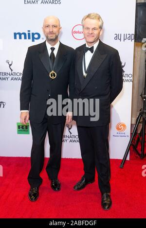 New York, United States. 25th Nov, 2019. Michael Epstein, Peter Worsley of John and Yoko: Above Us Only Sky by Eagle Rock Films attend 47th International Emmy Awards at Hilton hotel (Photo by Lev Radin/Pacific Press) Credit: Pacific Press Agency/Alamy Live News Stock Photo