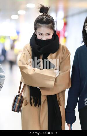 Chinese actress Bai Lu arrives at a Beijing airport before departure in ...