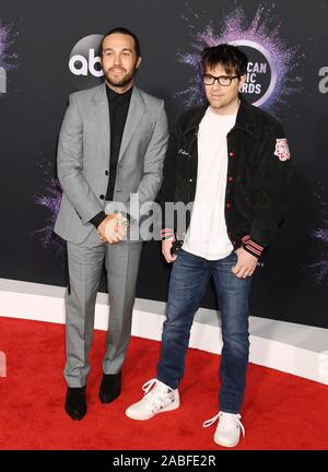 LOS ANGELES, CA - NOVEMBER 24: Pete Wentz (L) and Rivers Cuomo attend the 2019 American Music Awards at Microsoft Theater on November 24, 2019 in Los Angeles, California. Stock Photo