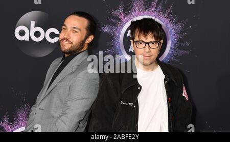 LOS ANGELES, CA - NOVEMBER 24: Pete Wentz (L) and Rivers Cuomo attend the 2019 American Music Awards at Microsoft Theater on November 24, 2019 in Los Angeles, California. Stock Photo