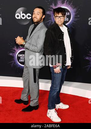 LOS ANGELES, CA - NOVEMBER 24: Pete Wentz (L) and Rivers Cuomo attend the 2019 American Music Awards at Microsoft Theater on November 24, 2019 in Los Angeles, California. Stock Photo