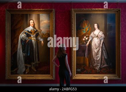 Mayfair, London, UK. 27th November 2019. The galleries and auction houses of London Art Week open their doors for the third LAW Winter, from 1st-6th December 2019. Image: Florence Evans, Director Weiss Gallery views: After Sir Anthony van Dyck (1599 – 1641). (Left): Charles I of England in coronation robes; (Right); Queen Henrietta Maria (a pair). Painted circa 1660s. Credit: Malcolm Park/Alamy Live News. Stock Photo