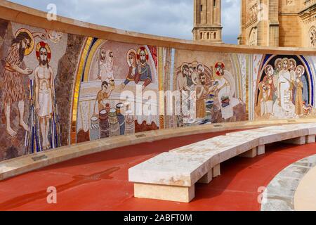 The mosaics of the Parvis Project at Ta’ Pinu Sanctuary in Gharb consists of 20 mysteries of the rosary by the Centro Aletti of Rome. Gozo, Malta. Stock Photo