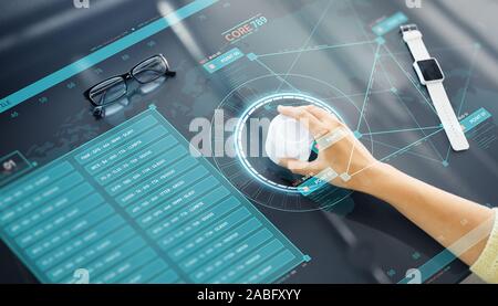 hand with control knob on interactive panel Stock Photo