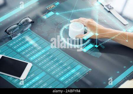 hand with control knob on interactive panel Stock Photo