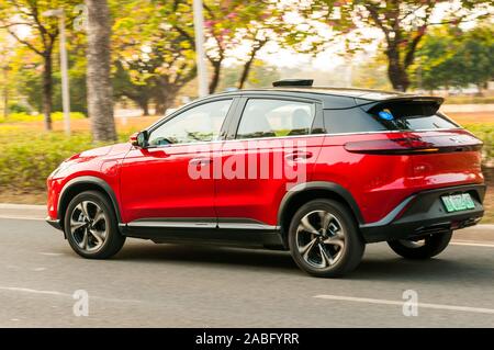 An Xpeng G3 From A Chinese Ev Startup Driving By In Guangzhou Stock Photo Alamy