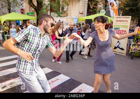 Members of a swing group dancing on the street, Sofia, Bulgaria Stock Photo